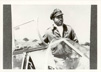 Photo of Lt. Col William R. Thompson at airplane