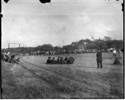 Prisoners playing baseball outside the yard